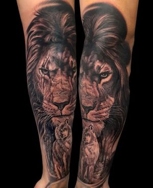 Get a fierce and lifelike lion tattoo on your forearm by the talented artist Mauro Imperatori. Show off your strength and courage with this stunning piece of art.