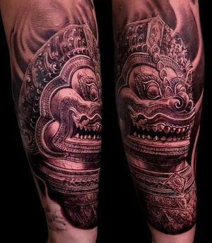 Get inked with a stunning black and gray mask tattoo by Mauro Imperatori that will bring your arm to life.