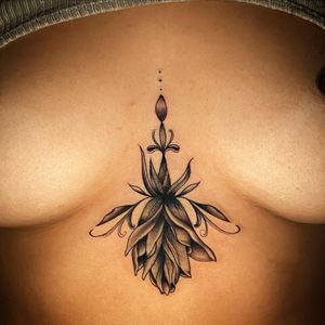 Illustrative floral design by Darren Brass on the sternum for a bold and elegant look.