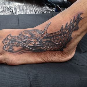 Capture the mythical power of a Japanese dragon with this stunning tattoo by Fernando Joergensen. Perfect for those who seek strength and protection.