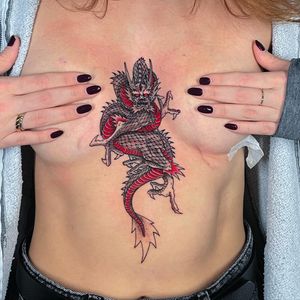 Experience the power and beauty of a traditional Japanese dragon tattoo by talented artist Fernando Joergensen.