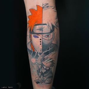 Capture the epic rivalry between Naruto and Sasuke with this dynamic anime tattoo on your lower leg by Marie Terry.