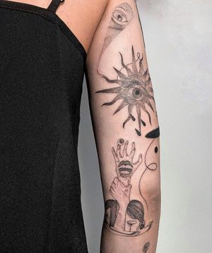 Discover the mystical beauty of this upper arm tattoo featuring a powerful sun and all-seeing eye. Expertly crafted by Alisa Hotlib in a bold illustrative style.