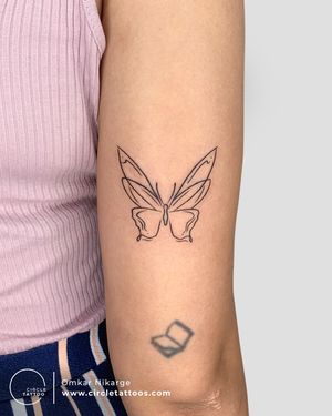 Line Art Butterfly Tattoo done by Omkar Nikarge at Circle Tattoo Delhi