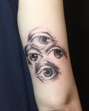 Beautiful illustrative blackwork eye tattoo on forearm by talented artist Slava.