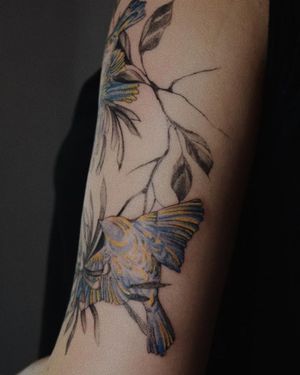 Stunning illustrative tattoo featuring a beautiful bird and flower, created by the talented artist Alisa. Perfect for arm placement.