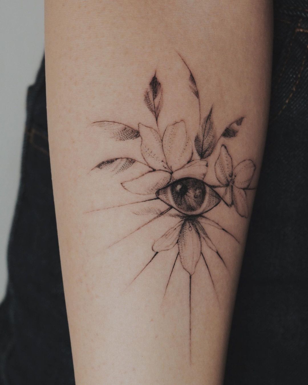 Flower and Eye Blackwork Tattoo • Tattoodo