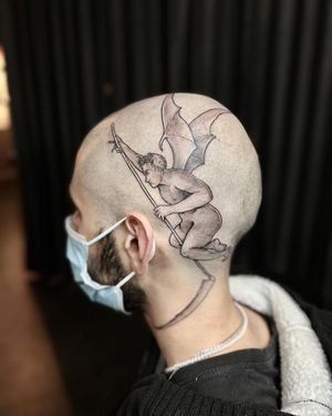 Get inked with this striking blackwork devil tattoo by Slava featuring intricate illustrative wings and a wicked scythe design.