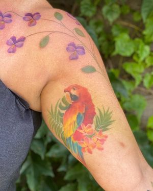 Parrot and flowers tattoo by Liz Alvarez
