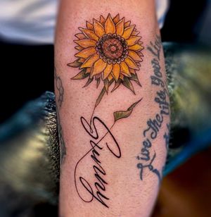 Sunflower and script 🌻