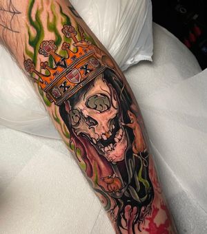 Neo-traditional style sleeve tattoo featuring a skull with a crown, roman numerals, a quote, and a rat. Created by Jethro Wood.