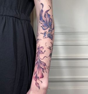 Get a stunning illustrative Japanese koi fish tattoo on your sleeve by the talented artist Kasia. Symbolizing perseverance and good fortune.