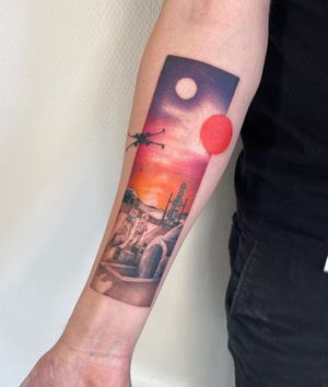 Creative forearm tattoo by Kasia featuring a moon, dog, and spaceship in a neo-traditional, illustrative style.