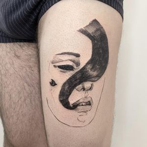 Discover the stunning blackwork tattoo of a woman on the upper leg, beautifully crafted by Mané. Perfect for those seeking a bold and unique tattoo design.