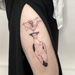Blackwork and illustrative style tattoo by Mané featuring a stunning design of a flower, statue, woman, and vase on the upper leg.