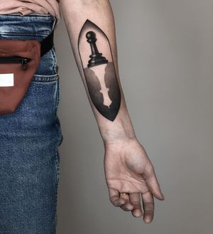 Discover the strategic beauty of this illustrative blackwork chess tattoo by talented artist Joanna. Perfect for chess enthusiasts!
