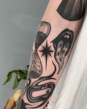 Get a bold blackwork star tattoo on your forearm by skilled artist Joanna for a unique and illustrative design.