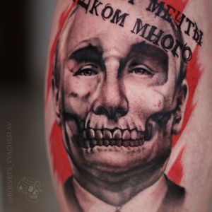 Unique blackwork tattoo featuring a skull, man and quote on the arm, expertly executed by tattoo artist Slava.