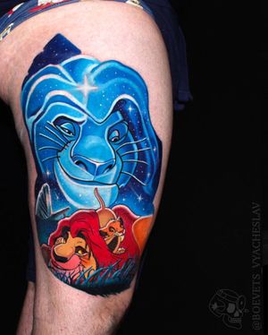 Get an illustrative upper leg tattoo of a fierce lion by Slava for a bold and unique look.
