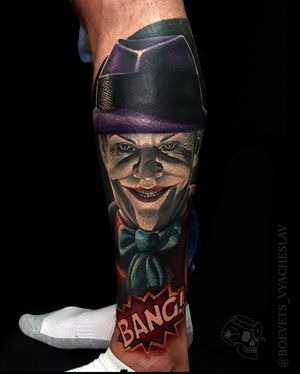 Illustrative tattoo of Jack Nicholson as the iconic clown, designed by Slava, featuring a joker hat