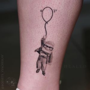 Get a unique blackwork ankle tattoo of a man with glasses holding a balloon by talented artist Slava