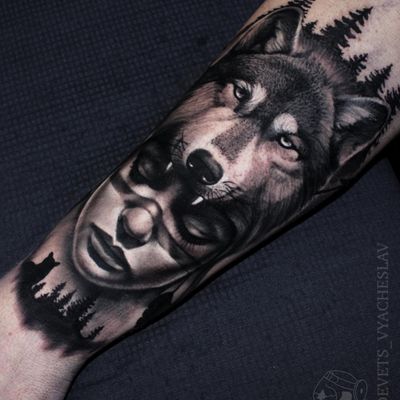 Impressive blackwork and illustrative design by Slava, featuring a wolf, tree, and woman for a bold and striking look.