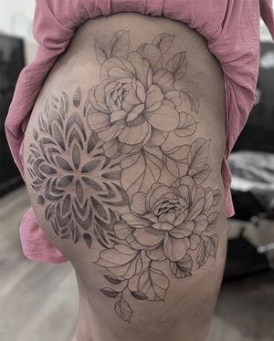 Beautiful tattoo by Federico Colantoni featuring intricate mandala and floral designs in dotwork style.