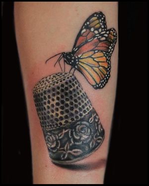 Realistic black and grey thimble and colour monarch butterfly 
