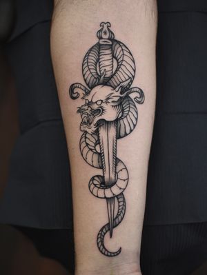 Intricately designed tattoo by artist Alejandro with a mix of snake, dragon, and dagger motifs in illustrative blackwork style.