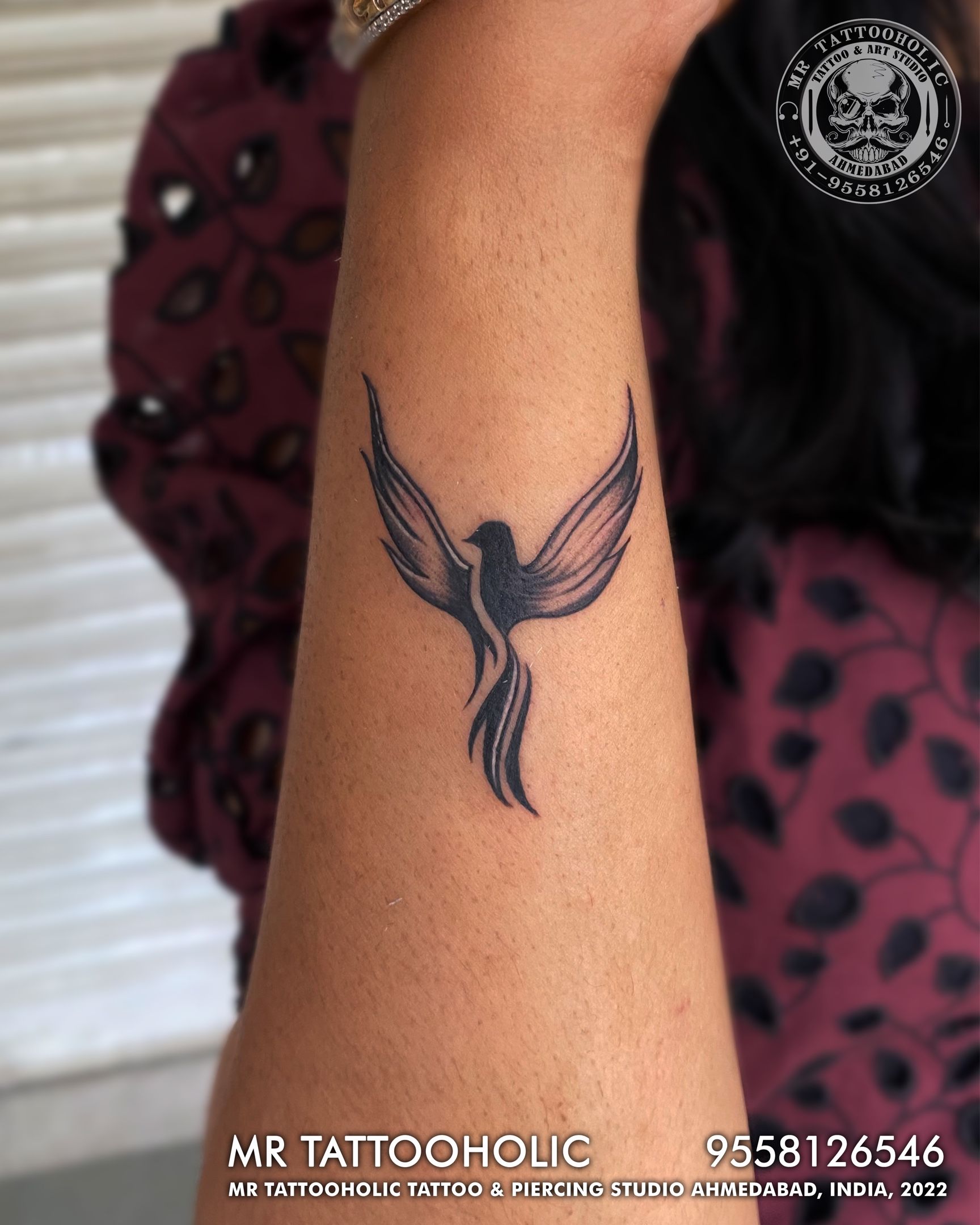 free bird tattoo on wrist