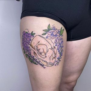 Beautifully detailed tattoo design combining elements of a flower and a skull, expertly crafted by Rachel Angharad.