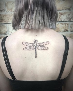 Adorn your upper back with Rachel Angharad's fine line, illustrative masterpiece featuring a mesmerizing dragonfly motif intertwined with intricate patterns.