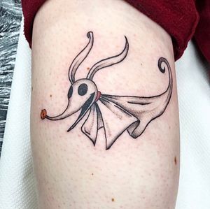 Illustrative tattoo by Rachel Angharad featuring a spooky dog ghost design on the lower leg.