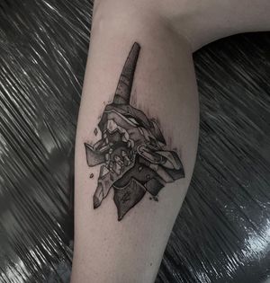 Get an iconic blackwork and illustrative tattoo of a monster from Evangelion on your lower leg by Shasza.