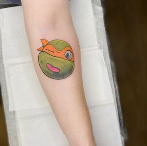 Get a vibrant and detailed new school turtle tattoo on your forearm by the talented artist Denis. Stand out with this unique illustrative design!