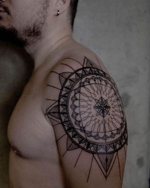 Discover the intricate beauty of Nastya's blackwork and fine line design featuring a mesmerizing mandala pattern.