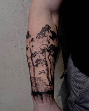 Experience intricate blackwork style with an illustrative tree design on your forearm by talented artist Nastya.