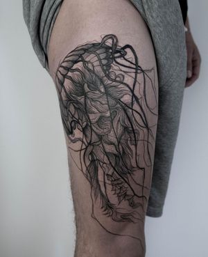 Transform your upper leg into a stunning masterpiece with this blackwork and illustrative jellyfish design by Nastya.