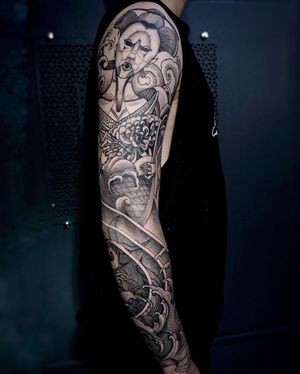 Unique blackwork tattoo combining snake, flower, and man motifs by Nastya.