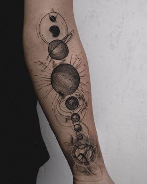 An illustrative tattoo featuring a moon and planet, beautifully executed by artist Nastya.