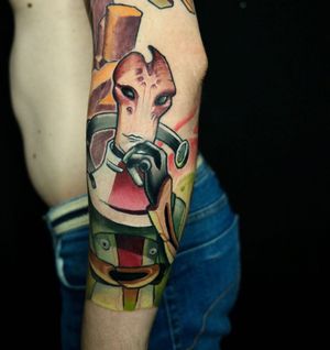 Get a futuristic robot tattoo on your arm by artist Denis in a unique new school style.