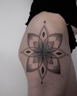 Elegant fine line mandala tattoo with intricate patterns, expertly done by Nastya.