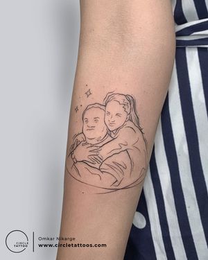 Father & Daughter Line Art Tattoo done by Omkar Nikarge at Circle Tattoo Delhi