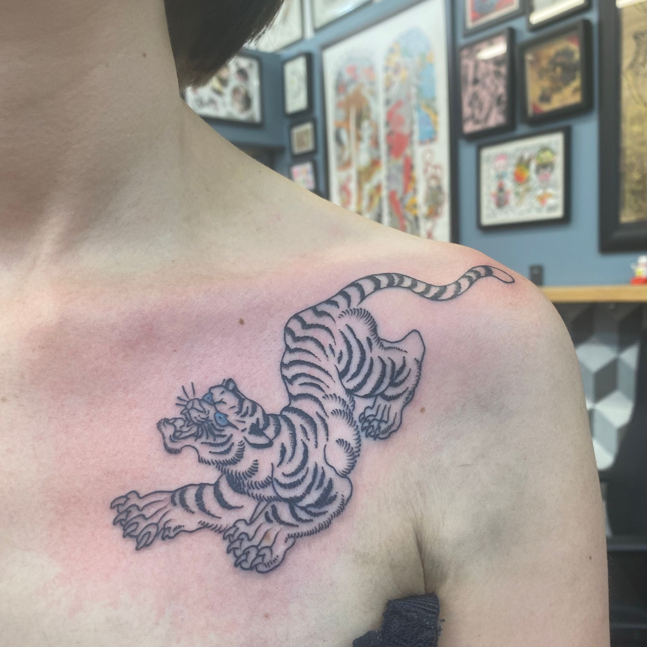 Buddhist Tiger Tattoo On Left Half Sleeve
