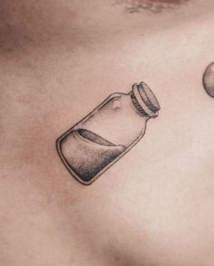 Get inked with a fine-line illustrative bottle design by George Francis on your chest. Stand out with this unique tattoo!