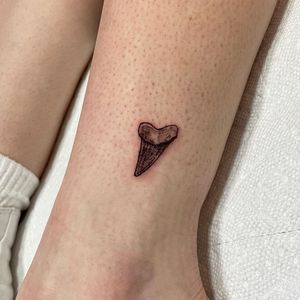 Get your teeth-inspired illustrative tattoo on ankle by Michaelle Fiore. Perfect for a subtle yet striking look!