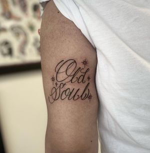 Bold lettering tattoo style