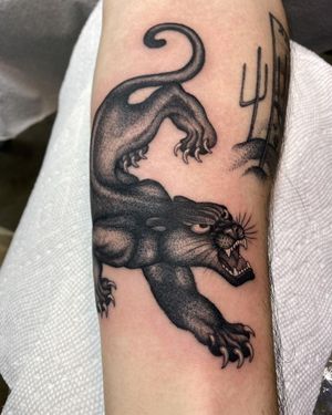 Blackwork panther design by Philip LaRocca, perfect for arm placement.