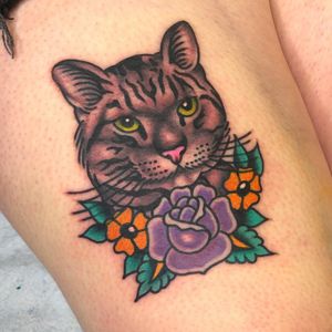 A stunning illustrative design of a cat and flower by the talented artist Nick Osbourn. Perfect for your upper leg!