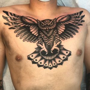 Get inked with a stunning blackwork owl design by Nick Osbourn, perfect for your chest. Stand out with this illustrative masterpiece.